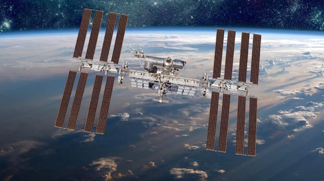 International Space Station over the planet earth Elements of this image furnished by NASA
