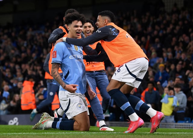 Soccer Football - FA Cup - Fifth Round - Manchester City v Plymouth Argyle - Etihad Stadium, Manchester, Britain - March 1, 2025 Manchester City's Nico O'Reilly celebrates scoring their second goal with Savinho REUTERS/Jaimi Joy