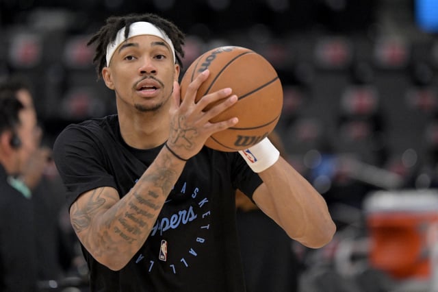 Dec 27, 2024; Inglewood, California, USA; Los Angeles Clippers guard Jordan Miller (11) warms up prior to the game against the Golden State Warriors at Intuit Dome. Jayne Kamin-Oncea-Imagn Images/File Photo