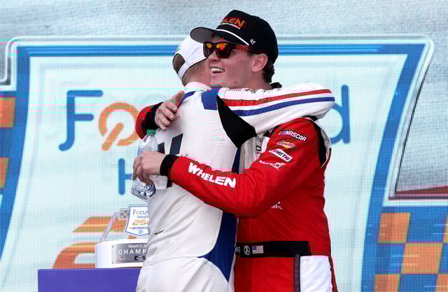 Connor Zilisch, driver of the #88 WeatherTech Chevrolet, (L) celebrates with Jesse Love, driver of the #2 Whelen Chevrolet, in victory lane after winning the NASCAR Xfinity Series Focused Health 250 at Circuit of The Americas on March 01, 2025 in Austin, Texas.