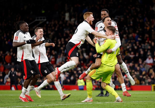 Soccer Football - FA Cup - Fifth Round - Manchester United v Fulham - Old Trafford, Manchester, Britain - March 2, 2025 Fulham's Bernd Leno celebrates with his team mates after he saves the penalty from Manchester United's Joshua Zirkzee to win the penalty shoot-out Action Images via Reuters/Jason Cairnduff