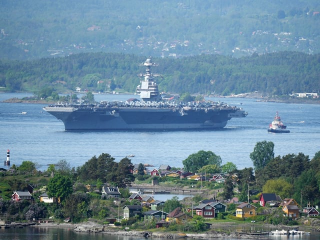 The 337-metre (1,106-foot) USS Gerald R. Ford aircraft carrier of the US Navy is seen in the Oslo Fjord, here seen from Ekebergskrenten in Oslo, Norway, on May 24, 2023. The ship is the world's largest warship and will be in port in Oslo for four days. Russia's embassy in Norway on Tuesday, May 23, 2023 hashly criticised the visit by the US aircraft carrier to Oslo as an "illogical and harmful" show of force. (Photo by Javad Parsa / NTB / AFP) / Norway OUT (Photo by JAVAD PARSA/NTB/AFP via Getty Images)