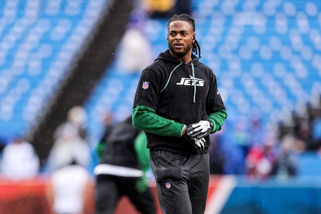 Davante Adams #17 of the New York Jets warms up prior to a game against the Buffalo Bills at Highmark Stadium on December 29, 2024 in Orchard Park, New York.