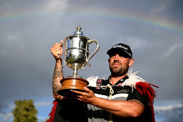 Ryan Peake of Australia celebrates with the New Zealand Open trophy after winning the 2025 New Zealand Open at Millbrook Resort on March 2, 2025 in Queenstown, New Zealand.