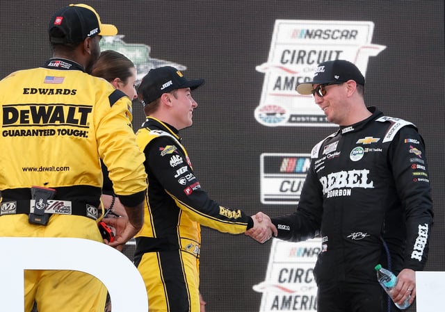 Kyle Busch, driver of the #8 Rebel Bourbon Chevrolet, (R) congratulates Christopher Bell, driver of the #20 DEWALT Toyota, in victory lane after Bell won the NASCAR Cup Series EchoPark Automotive Grand Prix at Circuit of The Americas on March 02, 2025 in Austin, Texas.