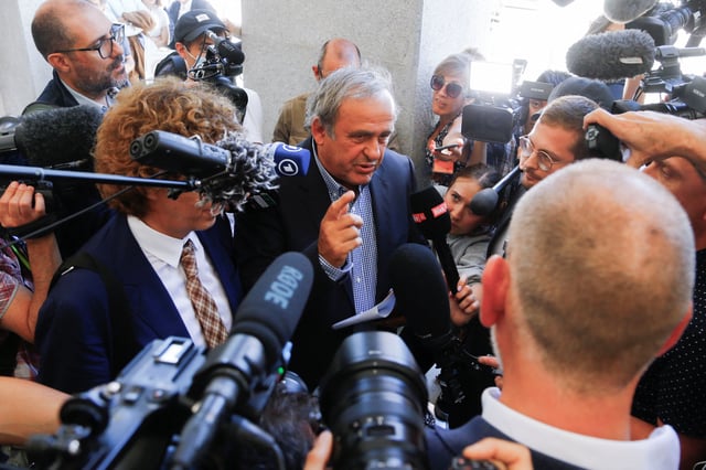 Former UEFA President Michel Platini speaks to the media after a trial at the Swiss Federal Criminal Court in Bellinzona, Switzerland July 8, 2022. REUTERS/Arnd Wiegmann/File Photo