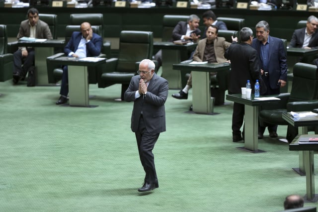 FILE - Iranian Foreign Minister Mohammad Javad Zarif walks to the podium during an open session of parliament in Tehran, Iran, Oct. 2, 2016. (AP Photo/Vahid Salemi, File)