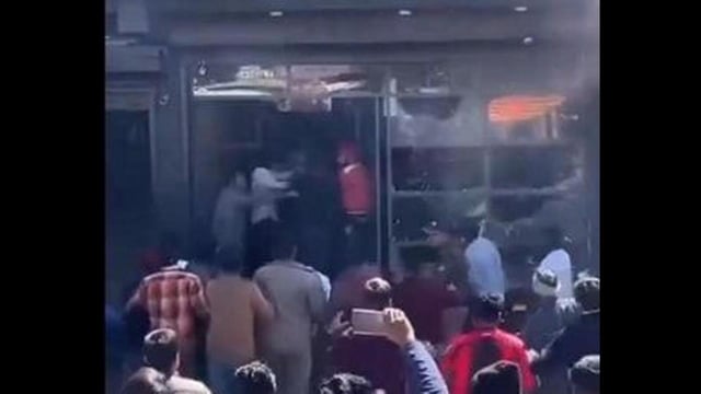 A video grab of the mob assaulting the Sikh businessman and vandalising his showroom in Uttarakhand’s Rishikesh on Sunday.