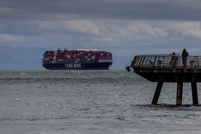 A cargo ship full of containers is seen at the port of Oakland as trade tensions escalate over U.S. tariffs, in Oakland, California, U.S., February 3, 2025. REUTERS/Carlos Barria/File Photo