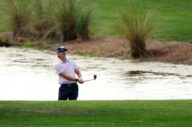 PALM BEACH GARDENS, FLORIDA - MARCH 01: Jake Knapp of the United States plays a shot on the ninth hole during the third round of the Cognizant Classic in The Palm Beaches 2025 at PGA National Resort And Spa on March 01, 2025 in Palm Beach Gardens, Florida. (Photo by Mike Mulholland/Getty Images)