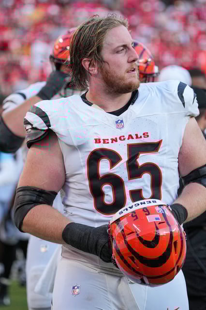 Sep 15, 2024; Kansas City, Missouri, USA; Cincinnati Bengals guard Alex Cappa (65) on the sidelines against the Kansas City Chiefs during the game at GEHA Field at Arrowhead Stadium. Mandatory Credit: Denny Medley-Imagn Images/File Photo