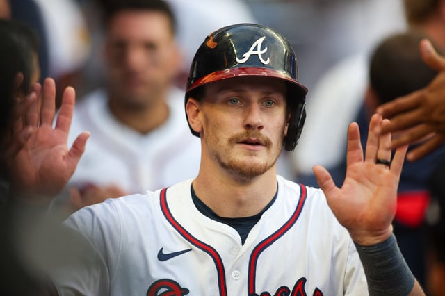 Sep 30, 2024; Atlanta, Georgia, USA; Atlanta Braves catcher Sean Murphy (12) celebrates with teammates after scoring a run against the New York Mets in the seventh inning at Truist Park. Mandatory Credit: Brett Davis-Imagn Images/File Photo