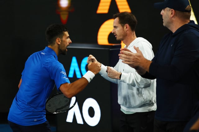 Tennis - Australian Open - Melbourne Park, Melbourne, Australia - January 22, 2025 Serbia's Novak Djokovic celebrates with his coach Andy Murray after winning his quarter final match against Spain's Carlos Alcaraz REUTERS/Edgar Su/File Photo