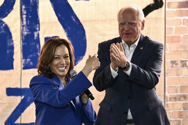 Former Vice President Kamala Harris speaks as Minnesota Governor Tim Walz looks on during a stop on their 2024 presidential campaign bus tour in Rochester, Pennsylvania, on August 18, 2024. Walz said he and Harris have only spoken a &#34;couple times&#34; since November&#39;s election.