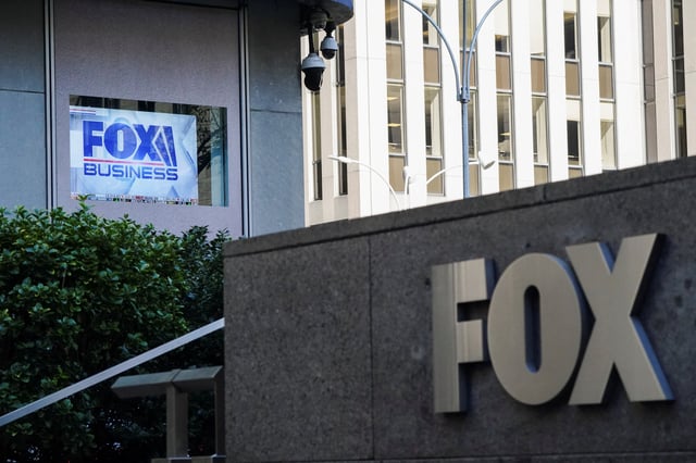 A view of the signage outside the News Corporation building, after it was announced that Rupert Murdoch would step down as chairman of News Corp and Fox in favour of his son Lachlan Murdoch, in New York, U.S., September 21, 2023.  REUTERS/Bing Guan/File Photo