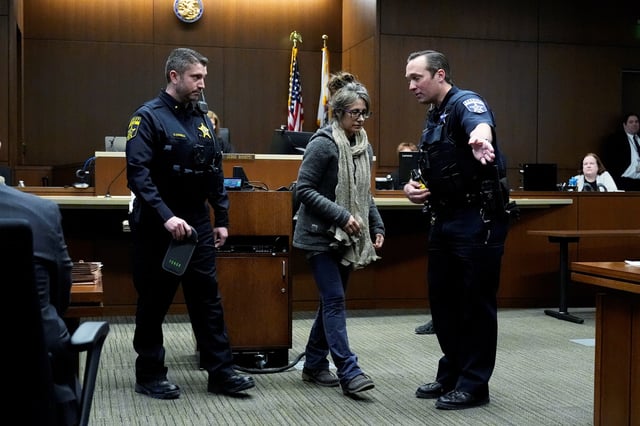Robert E. Crimo III's mother Denise Pesina walks back to her seat after she listened to Judge Victoria A. Rossetti, during Robert E. Crimo III's trial in Judge Victoria A. Rossetti's courtroom in Waukegan, Ill., U.S., March 3, 2025.     Nam Y. Huh/Pool via REUTERS