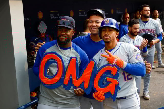Francisco Lindor (R) #12 of the New York Mets celebrates with Luis Severino (L) #40 and Jose Quintana (C) #62 with an OMG sign after hitting a solo home run in the ninth inning during a game against the Toronto Blue Jays at Rogers Centre on September 11, 2024 in Toronto.