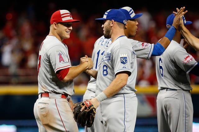 American League All-Star Mike Trout #27 of the Los Angeles Angels of Anaheim celebrates with American League All-Star Mike Moustakas #8 of the Kansas City Royals after defeating the National League with a score of 6 to 3 in the 86th MLB All-Star Game at the Great American Ball Park on July 14, 2015 in Cincinnati.