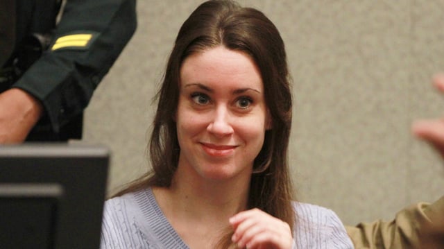 Casey Anthony smiles before the start of her sentencing hearing on charges of lying to a law enforcement officer at the Orange County Courthouse July 7, 2011 in Orlando, Florida.