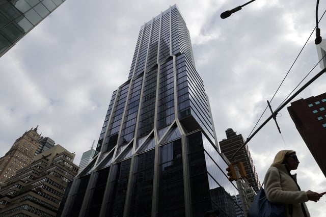 A person walks by the Citadel Securities offices on Park Avenue in Manhattan, New York City, U.S., October 31, 2022.  REUTERS/Andrew Kelly/File Photo