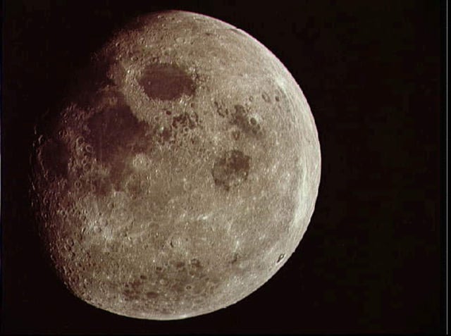 This is a NASA photograph of a nearly full moon taken from the Apollo 8 spacecraft. NASA scientists are still studying the potential impact of asteroid 2024 YR4 on the moon after an Earth impact was ruled out. 
