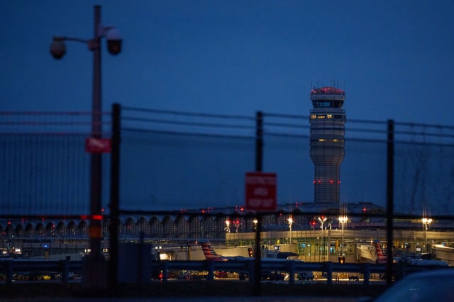 ARLINGTON, VIRGINIA - JANUARY 31: Reagan National Airport is visible at dawn following the midair collision between an American Airlines plane and a military helicopter earlier this week in the Potomac River, January 31, 2025 in Arlington, Virginia. Flights have resumed in and out of Reagan National Airport after an American Airlines flight from Wichita, Kansas collided midair with a military Black Hawk helicopter while on approach to the airport. According to reports, there were no survivors among the 67 people onboard both aircraft. (Photo by Andrew Harnik/Getty Images)