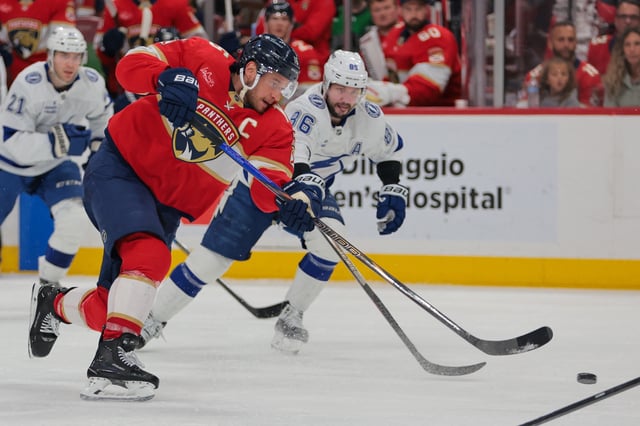 Mar 3, 2025; Sunrise, Florida, USA; Florida Panthers center Aleksander Barkov (16) scores against the Tampa Bay Lightning during the second period at Amerant Bank Arena. Mandatory Credit: Sam Navarro-Imagn Images