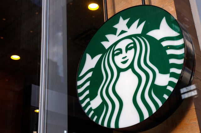 A Starbucks store sign is seen in New York City, U.S., February 25, 2025. REUTERS/Shannon Stapleton/File Photo