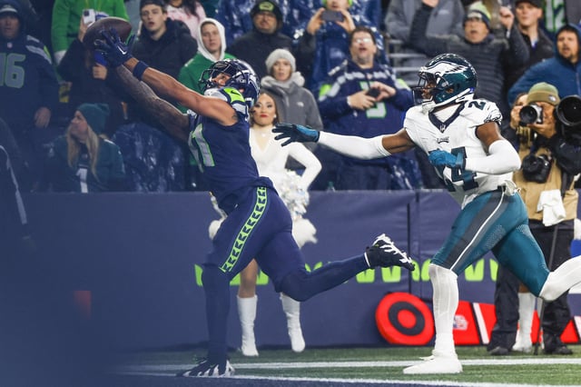 Dec 18, 2023; Seattle, Washington, USA; Seattle Seahawks wide receiver Jaxon Smith-Njigba (11) catches a touchdown pass against Philadelphia Eagles cornerback James Bradberry (24) during the fourth quarter at Lumen Field. Mandatory Credit: Joe Nicholson-USA TODAY Sports/ File Photo