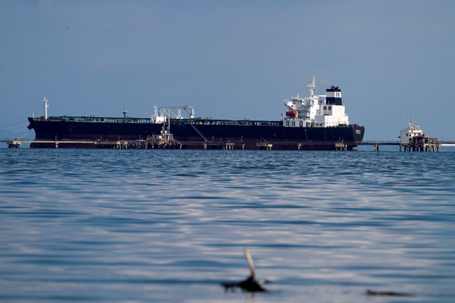 Oil tanker Kerala, chartered by Chevron, is being loaded in the Bajo Grande oil terminal at Maracaibo Lake, in the municipality of San Francisco, Venezuela, January 5, 2023. REUTERS/Isaac Urrutia/File Photo