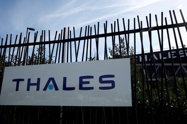 The logo of French defence and electronics group Thales is seen outside a company building in Gennevilliers near Paris, France, March 25, 2024. REUTERS/Sarah Meyssonnier/File Photo