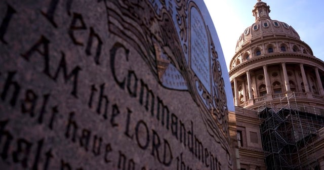 The Texas Capitol and the Ten Commandments Monument at sunrise on Tuesday, June 6, in Austin, Texas.