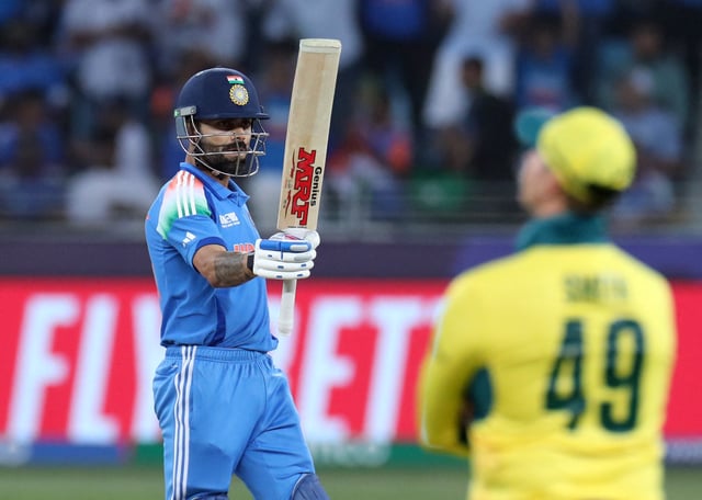 Cricket - ICC Men's Champions Trophy - Semi Final - India v Australia - Dubai International Stadium, Dubai, United Arab Emirates - March 4, 2025 India's Virat Kohli celebrates after reaching his half century REUTERS/Satish Kumar