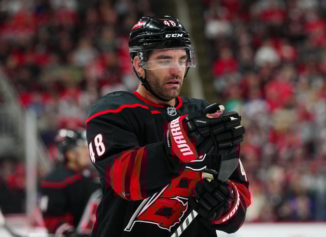 Mar 1, 2025; Raleigh, North Carolina, USA;  Carolina Hurricanes left wing Jordan Martinook (48) looks on against the Edmonton Oilers during the second period at Lenovo Center. Mandatory Credit: James Guillory-Imagn Images