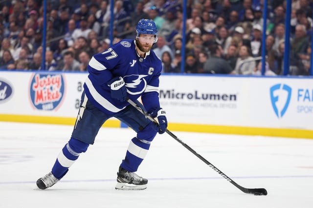 Mar 4, 2025; Tampa, Florida, USA; Tampa Bay Lightning defenseman Victor Hedman (77) controls the puck against the Columbus Blue Jackets in the second period at Amalie Arena. Mandatory Credit: Nathan Ray Seebeck-Imagn Images