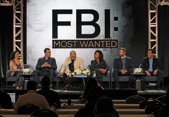 Keisha Castle-Hughes (L), Julian McMahon, Dick Wolf, Roxy Sternberg, Kellan Lutz and Nathaniel Arcand of &#34;FBI: Most Wanted&#34; speak during the CBS segment of the 2020 Winter TCA Press Tour at The Langham Huntington, Pasadena on January 12, 2020 in Pasadena, California.