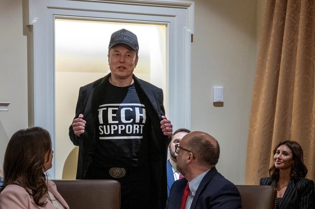 Elon Musk wears a shirt that says &#34;Tech Support&#34; as he speaks during the first cabinet meeting of US President Donald Trump&#39;s second term in the Cabinet Room at the White House in Washington, DC, on February 26, 2025.
