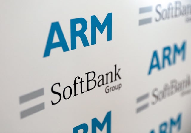Logos of ARM Holdings Plc and SoftBank Group Corp sit on a background during a news conference in London, U.K., on Monday, July 18, 2016. SoftBank Group Corp. agreed to buy ARM Holdings Plc for 24.3 billion pounds ($32 billion), securing a slice of virtually every mobile computing gadget on the planet and future connected devices in the home. Photographer: Chris Ratcliffe/Bloomberg via Getty Images