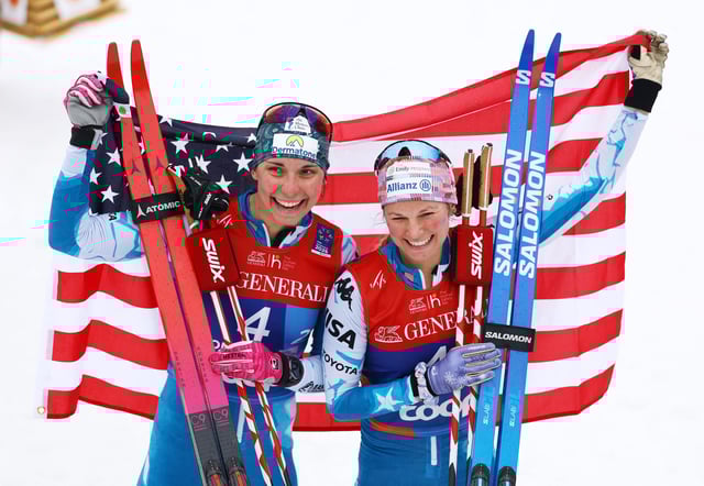 Nordic Skiing - FIS Nordic World Ski Championships - Trondheim, Norway - March 5, 2025 Julia Kern and Jessie Diggins of the U.S. celebrate finishing second in the women's team sprint classic REUTERS/Kai Pfaffenbach