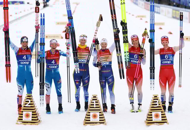 Nordic Skiing - FIS Nordic World Ski Championships - Trondheim, Norway - March 5, 2025 Sweden's Jonna Sundling and Maja Dahlqvist celebrate winning the women's team sprint classic alongside runner-up Julia Kern and Jessie Diggins of the U.S. and third placed Switzerland's Anja Weber and Nadine Faehndrich REUTERS/Kai Pfaffenbach