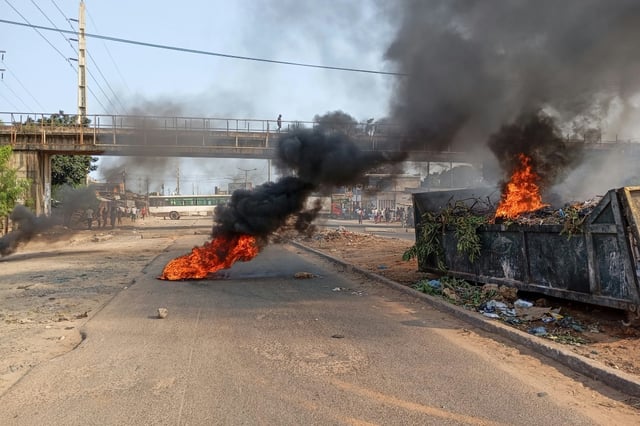 More than a dozen people were injured when police clashed with opposition supporters