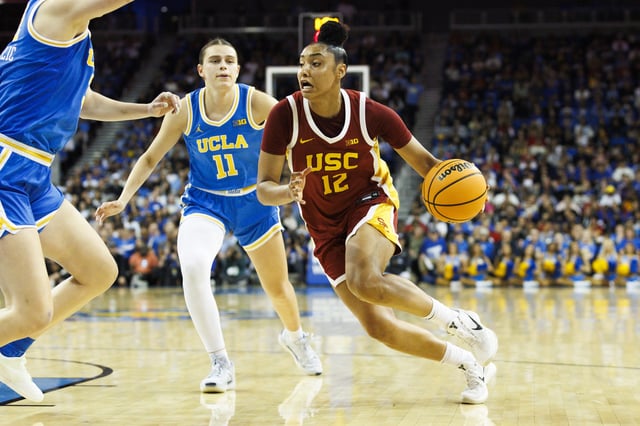 JuJu Watkins #12 of the USC Trojans dribbles during the second half against UCLA Bruins at Pauley Pavilion on March 1, 2025 in Los Angeles, California.