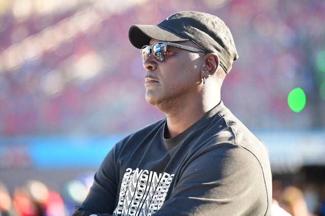 Michael Jordan, co-owner of 23XI Racing, watches qualifying for the 2024 NASCAR Cup Series championship race at Phoenix Raceway.