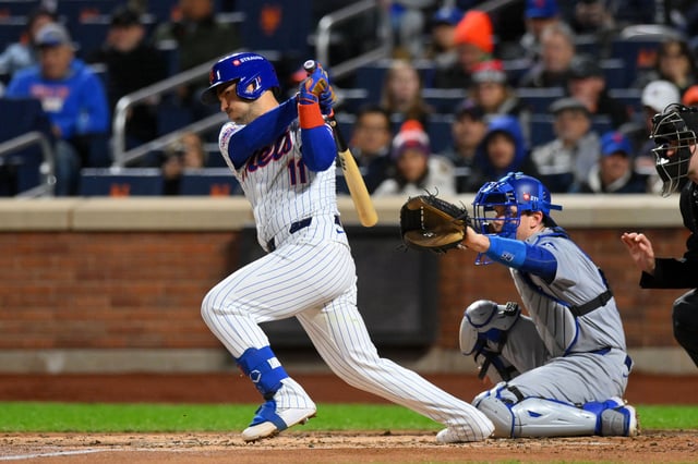 Oct 17, 2024; New York City, New York, USA; New York Mets second base Jose Iglesias (11) hits a single in the second inning during game four of the NLCS for the 2024 MLB playoffs at Citi Field. Mandatory Credit: John Jones-Imagn Images/File Photo