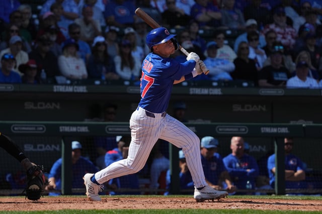 Mar 4, 2025; Mesa, Arizona, USA; Chicago Cubs Matt Shaw hits a single against the San Diego Padres in the fourth inning at Sloan Park. Mandatory Credit: Rick Scuteri-Imagn Images/File Photo