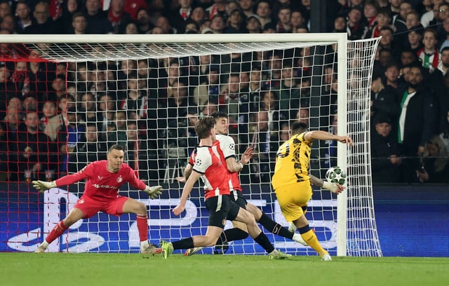 Soccer Football - Champions League - Round of 16 - First Leg - Feyenoord v Inter Milan - Feyenoord Stadium, Rotterdam, Netherlands - March 5, 2025  Inter Milan's Lautaro Martinez scores their second goal REUTERS/Stephane Mahe