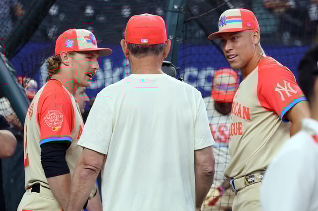 Gunnar Henderson #2 of the Baltimore Orioles, Bruce Bochy #15 of the Texas Rangers and Aaron Judge #99 of the New York Yankees speak prior to the 94th MLB All-Star Game presented by Mastercard at Globe Life Field on July 16, 2024 in Arlington, Texas.