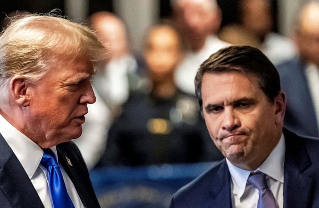 Former U.S. President Trump walks alongside his attorney Todd Blanche after a jury found him guilty of all 34 felony counts in his criminal trial at New York State Supreme Court in New York, New York, U.S., 30 May 2024. Mark Peterson/Pool via REUTERS/File Photo