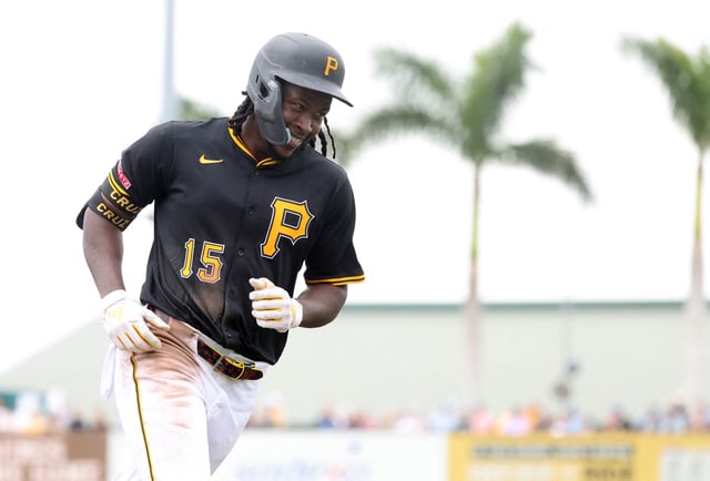 Mar 5, 2025; Bradenton, Florida, USA;  Pittsburgh Pirates outfield Oneil Cruz (15) smiles as he runs around the bases after he hit a 3-run home run during the fifth inning against the Toronto Blue Jays at LECOM Park. Mandatory Credit: Kim Klement Neitzel-Imagn Images