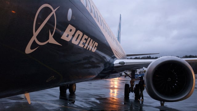 A Boeing 737 MAX sits outside the hangar during a media tour of the Boeing 737 MAX at the Boeing plant in Renton, Washington December 8, 2015.
